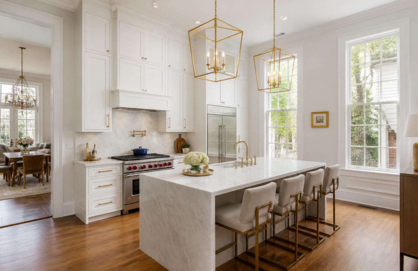 High-end kitchen renovation featuring custom cabinetry and a large marble island in a New Orleans home.